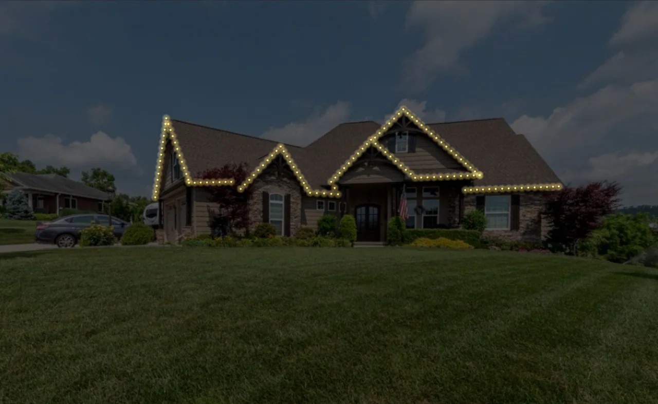 Design mockup adding warm-white lights along the side peaks and upper front gable of the same home
